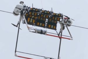 A close up of a drone being used to install a bird diverter.
