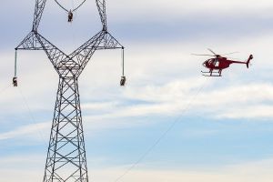 Helicopter flying above the MMTP towers.