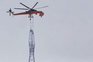 Tower assembly using a helicopter.